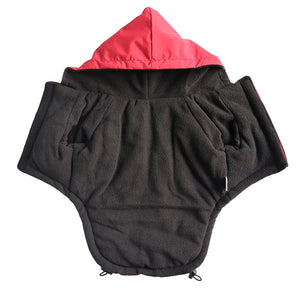 Waterproof dog jacket with reflective trim and fleece lining, providing winter weather protection
