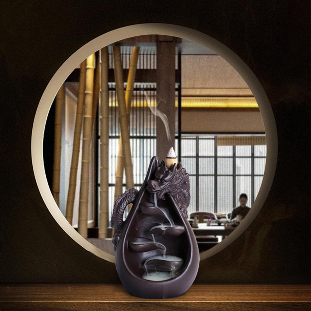 Dragon-shaped incense burner with smoke effect on a white background