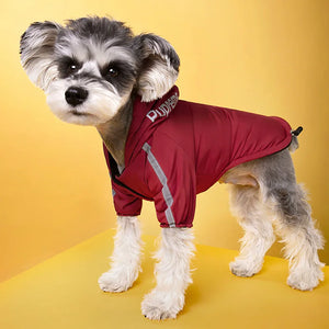 Waterproof dog jacket with reflective trim and fleece lining, providing winter weather protection
