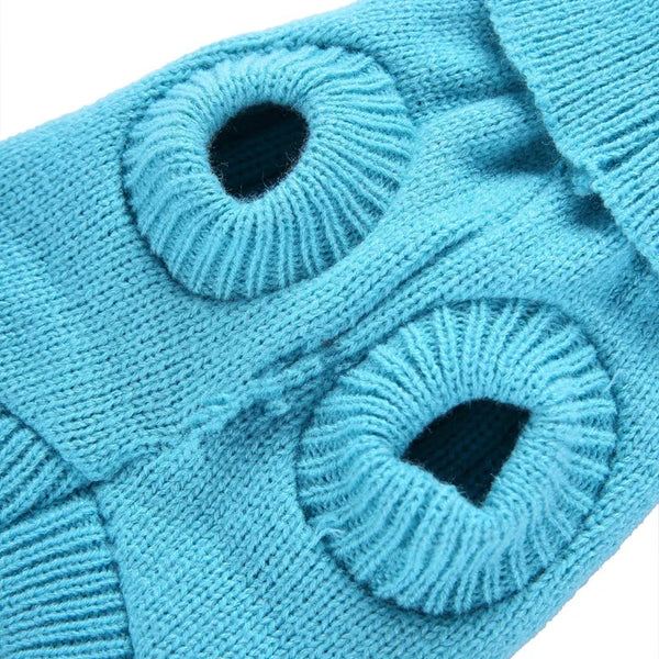 Cable-knit dog sweater close-up - turtleneck detail and knit texture light blue
