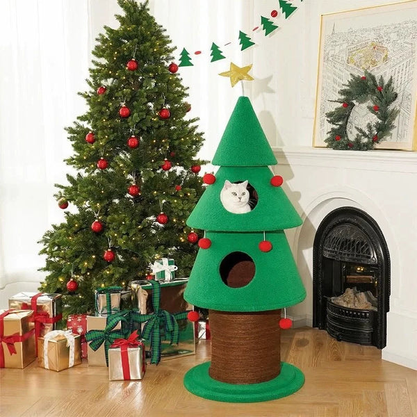 Green cat tree shaped like a Christmas tree with a cat peeking out, decorated Christmas tree and presents in the background.