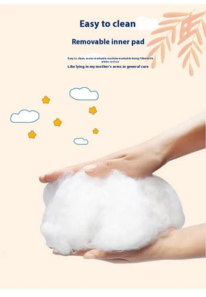 Japanese pet sleeping pod easy to clean - hands holding removable washable white cotton inner pad
