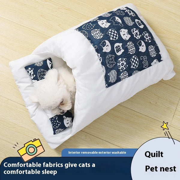 Japanese pet sleeping pod with lucky cat pattern - white dog burrowed inside cozy quilt bed

