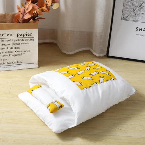 Japanese pet sleeping pod with yellow duck pattern - lifestyle shot in modern home setting
