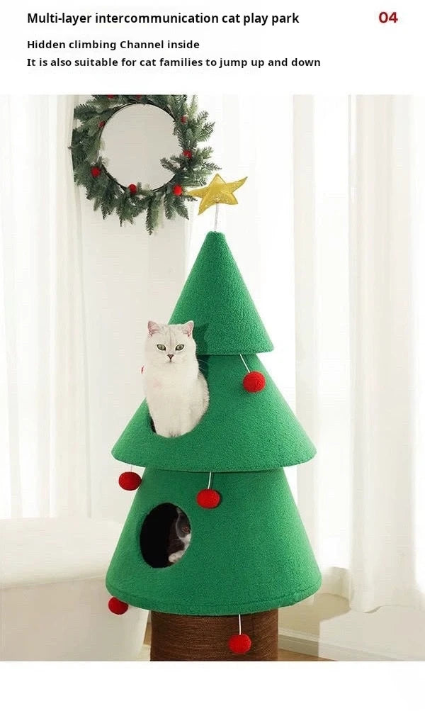 Green cat-shaped tree with a white cat sitting on top, against a white curtain background.