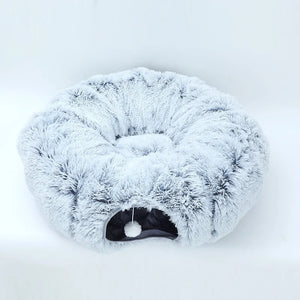 Fluffy white pet bed on a white background