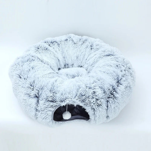 Fluffy white pet bed on a white background