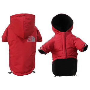 Waterproof dog jacket with reflective trim and fleece lining, providing winter weather protection