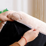 Close-up of removable plush cover and anti-slip base on cat bed sofa, easy to clean and secure f