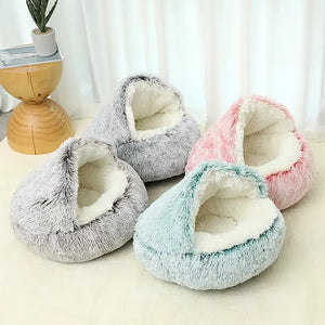 Four cozy cat cave beds in grey, pink, and blue plush fabric — soft hooded design providing warmth and security for cats and small pets