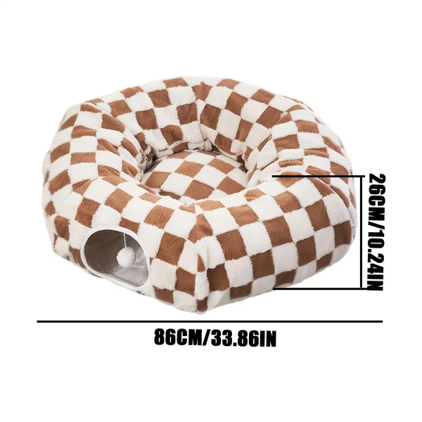 Brown and white checkerboard donut cat tunnel bed with hanging toy ball, showing size 86 cm by 26 cm for indoor cats and small pets