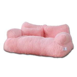 Pink plush cat bed sofa with backrest and side pillows, winter warm nest for cats and small dogs.